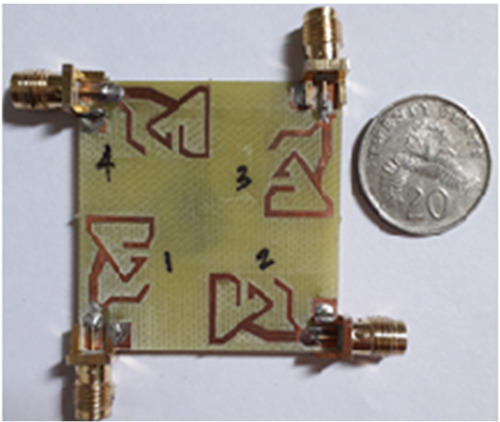 A tri-band triangular lamp post shaped quad port MIMO antenna