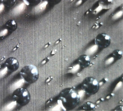 Effect of Heat Treatment on Wettability and Condensation Heat Transfer of Laser-Textured Stainless Steel Surfaces