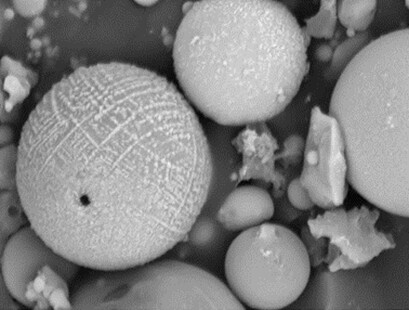 Properties of Epoxy Resins-Based Composite Materials with the Addition of Microspheres