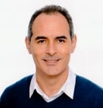 A headshot photo of Joel González-Cabrera