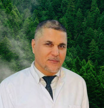 A headshot photo of Kasim Sakran Abass, Emerging Editor