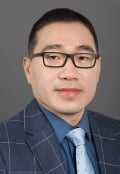 A headshot photo of Editor Bo Zhang