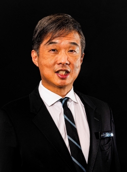 A headshot photo of Toh Han Chong