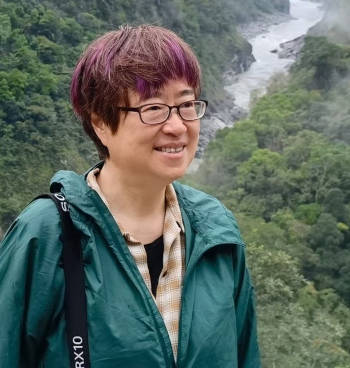 A headshot photo of Lu Zhi